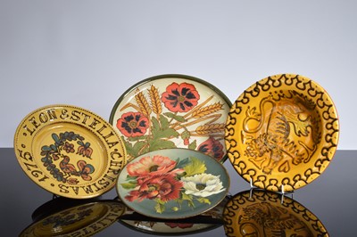 Lot 284 - Four studio pottery decorative wall plates