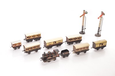Lot 96 - Bing 0 Gauge Locomotive and Passenger rolling stock (10)