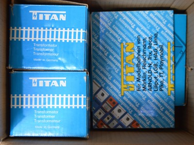 Lot 169 - Lionel/Marklin 0 Gauge modern issue 3-rail tinplate track and transformers (95)
