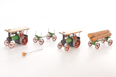 Lot 498 - Two Mamod live Steam TE1a Traction Engines with Log Trailers (4)