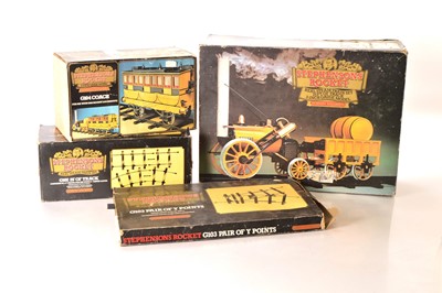 Lot 535 - A Hornby G100 3.5" Gauge Live Steam Stephenson's Rocket Set with G104 Coach and Additional Track (4 boxes)