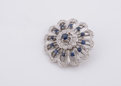 Lot 164 - A continental white metal sapphire and diamond target brooch
