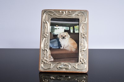 Lot 544 - A George V period silver mounted photograph frame