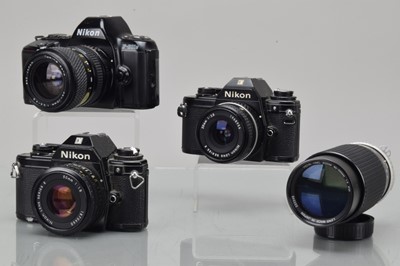 Lot 212 - Three Nikon SLR Cameras