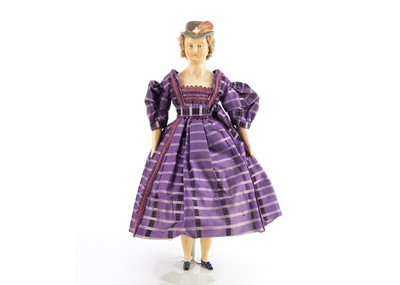 Lot 1255 - A German waxed composition shoulder head doll with moulded bonnet