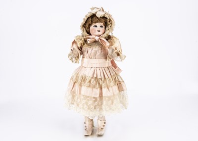 Lot 1272 - A Gigoteur or Kicking/Crying Steiner bebe