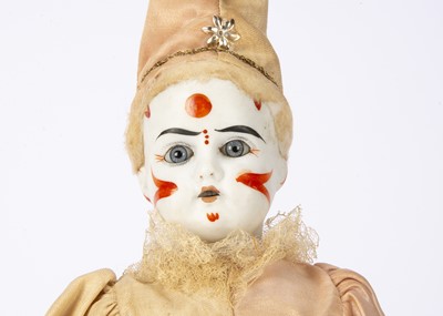 Lot 1274 - A German bisque headed whiteface clown doll
