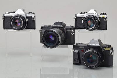 Lot 512 - Four Pentax SLR Cameras