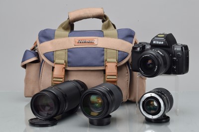 Lot 514 - A Nikon F-801 SLR Camera and AF Lenses
