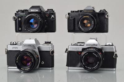 Lot 519 - Four SLR Cameras