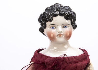 Lot 1361 - A 19th century C F Kling china shoulder head doll with 'Dolly Madison' hairstyle