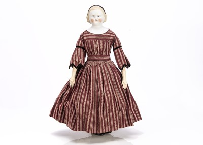 Lot 1362 - A mid 19th century bisque shoulder-head child doll