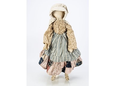 Lot 1380 - An Amish faceless cloth doll
