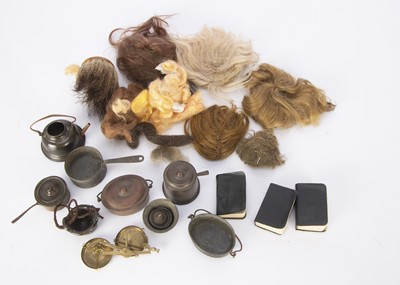 Lot 1391 - Doll’s copper cooking pots and wigs