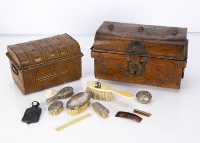 Lot 1404 - Two wood grained tin doll’s trunks