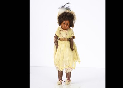 Lot 1438 - A small German brown bisque headed doll