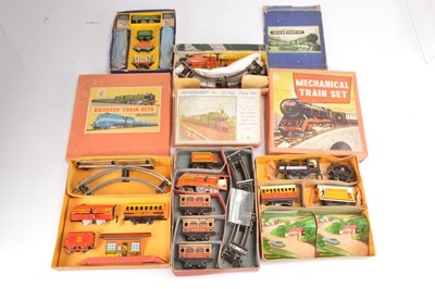 Lot 571 - Brimtoy Chad Valley Mettoy and other lesser manufacturers 00 and 0 Gauge tinplate clockwork Train Sets and Accessories (5)