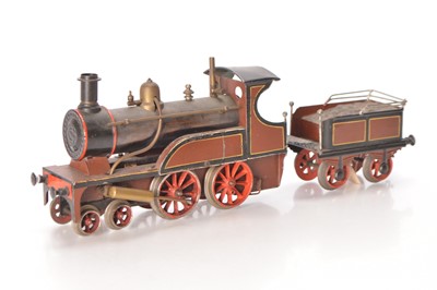 Lot 631 - Carette Gauge 1 4-4-0 Loco & Tender lined brown