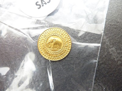 Lot 97 - A small gold coin from Thailand