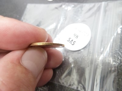 Lot 98 - A small gold coin from Tibet