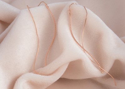 Lot 118 - A pair of 9ct gold pull through rose gold earrings