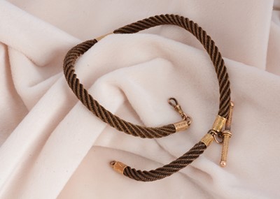 Lot 123 - A 19th Century hair and pinchbeck albert