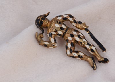 Lot 177 - An art deco gilt metal enamel harlequin brooch