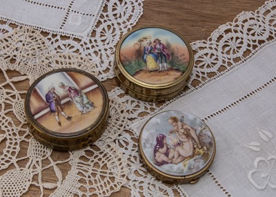 Lot 284 - Three 1930s circular gilt metal hand painted compacts