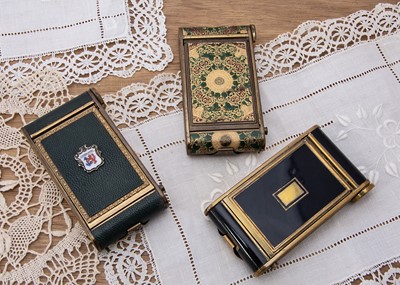 Lot 320 - Three vintage gilt metal 'Camera' compacts