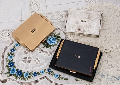 Lot 334 - Three similar rectangular Deco compacts