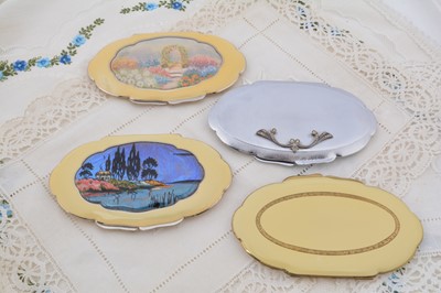 Lot 345 - Four scalloped edged oval TLM 1930s compacts