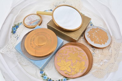 Lot 347 - Gilt metal circular Pygmalion compacts