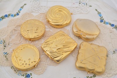 Lot 351 - Estee Lauder 1990s 'Golden' signs of the Zodiac compacts