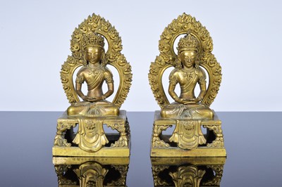 Lot 373 - A pair of antique Far Eastern gilt bronnze Buddhist figures