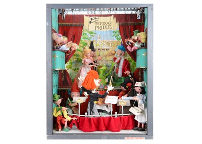 Lot 104 - A Pelham Puppets mechanically driven the Frog Prince theatre shop display
