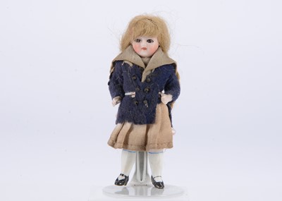 Lot 647 - A German all-bisque dolls’ house doll