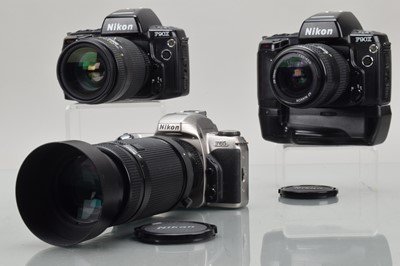 Lot 371 - Three Nikon SLR Cameras