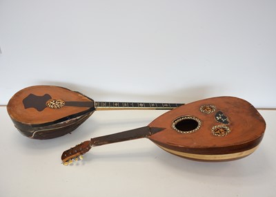 Lot 734 - Mandolins Five Banjos