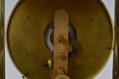 Lot 16 - An early 20th century Eureka Clock Co Ltd electronic brass and glazed mantle clock