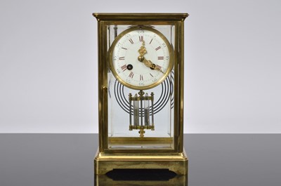 Lot 30 - A French late 19th century brass mantle clock