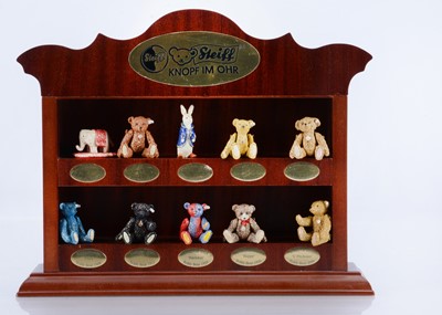 Lot 29 - A complete set of ten Steiff pewter miniatures, in wooden display case