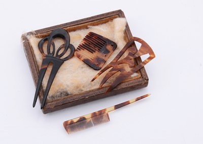 Lot 761 - Two 19th century French fashion doll’s tortoiseshell hair combs