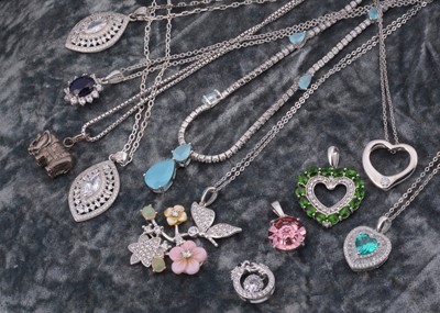Lot 63 - A collection of gem set silver pendants