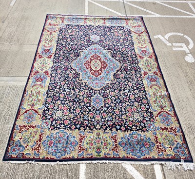 Lot 489 - A large 20th century Persian woollen and cotton carpet