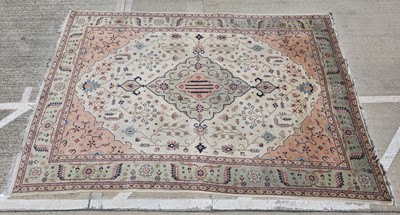 Lot 490 - A large 20th century Middle Eastern woollen carpet