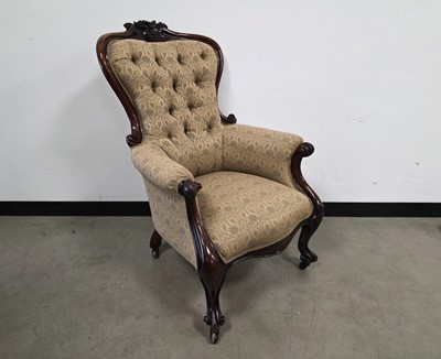 Lot 516 - A Victorian and later carved walnut and upholstered armchair