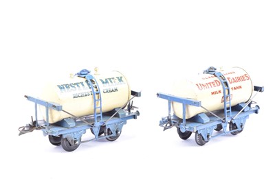 Lot 104 - Hornby 0 Gauge cream and blue Milk Tank wagons