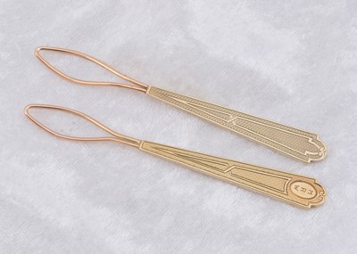 Lot 241 - A pair of Tiffany & Co button loops
