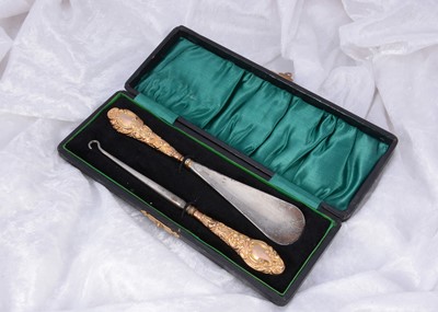 Lot 301 - A 9ct gold Victorian shoehorn and button hook set