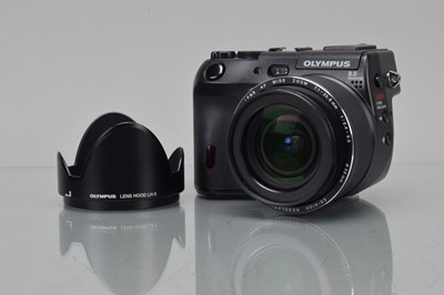 Lot 6 - An Olympus Camedia C-8080 Wide Zoom Digital Bridge Camera
